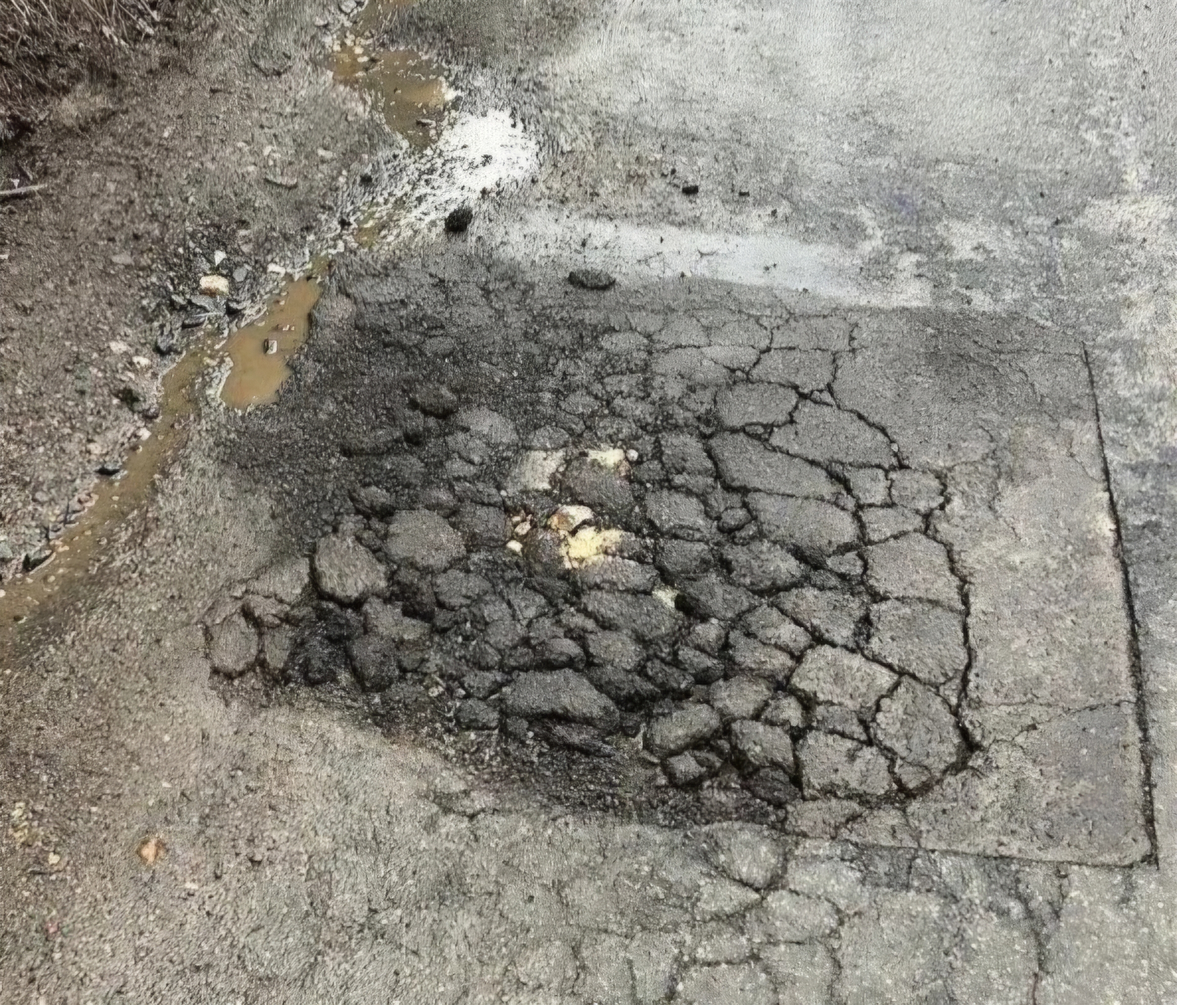 Pothole repair before
